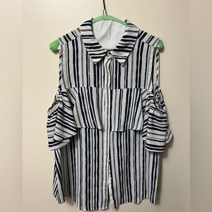 Super cute blue and white striped top. Size L.  Fun sleeves.